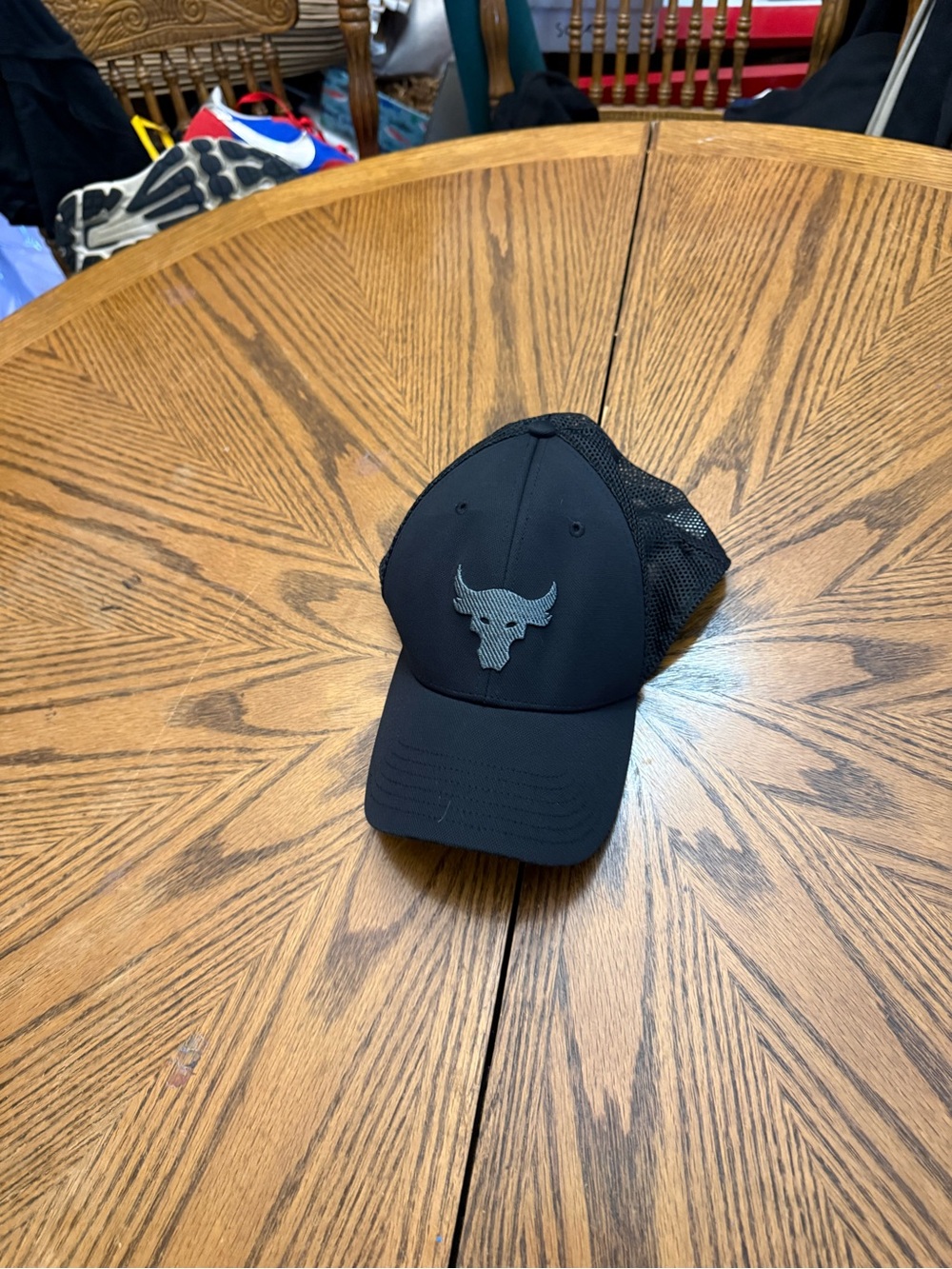 Under Armour Black Mesh Trucker Cap with Rock Logo